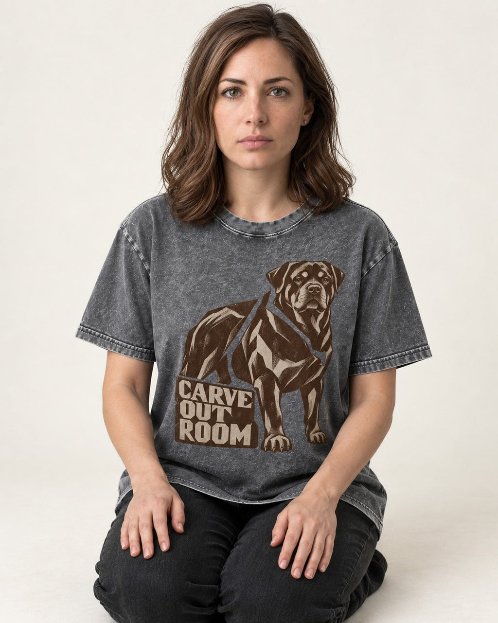 Carve Out Room for Rottweiler Washed Tee in Gray, worn by a seated model