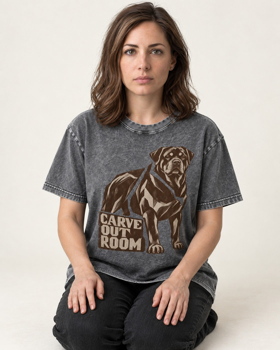 Carve Out Room for Rottweiler Washed Tee in Gray, worn by a seated model
