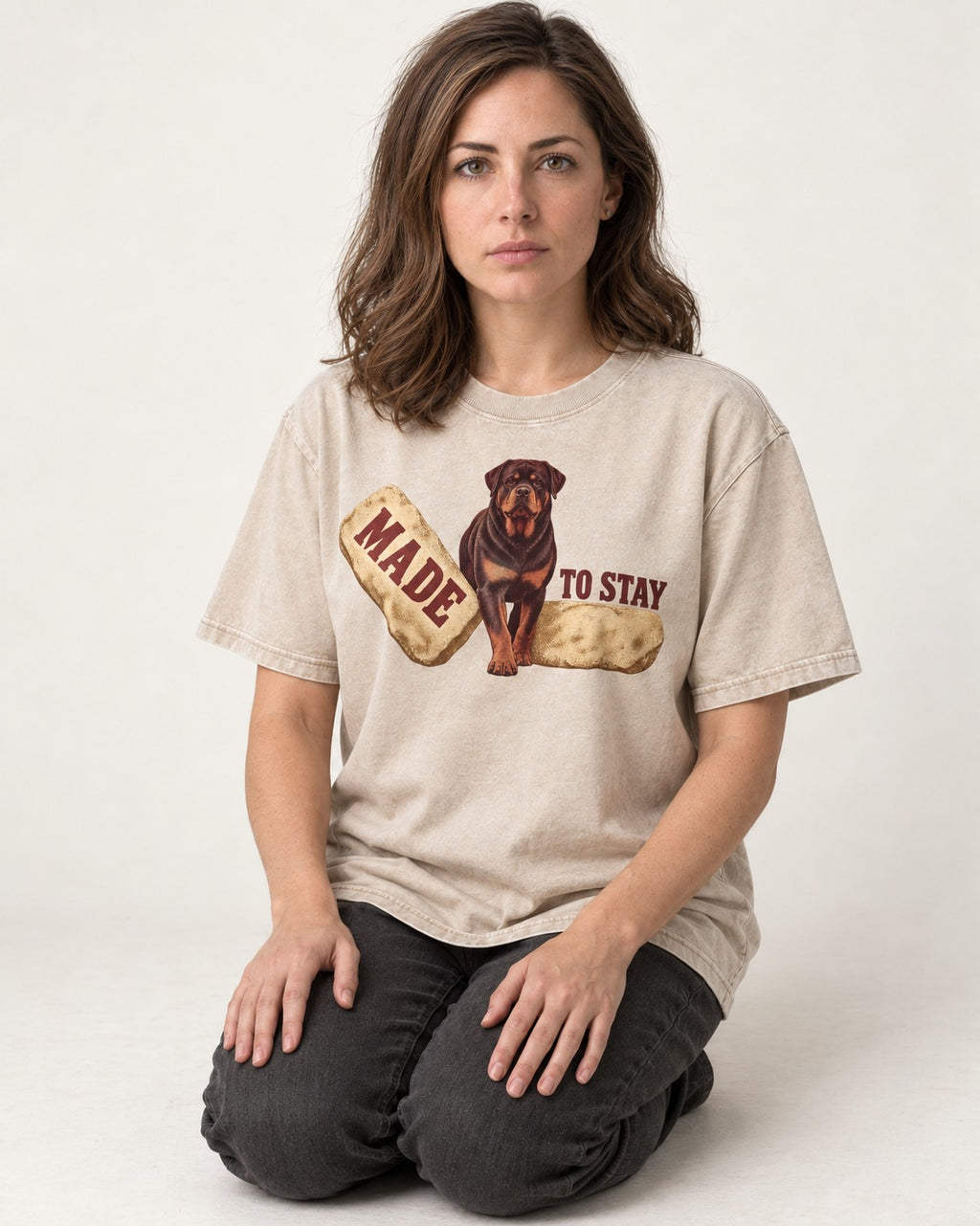 Rottweiler Made to Stay Stepping Stone Graphic Washed Tee in Apricot, worn by a seated model