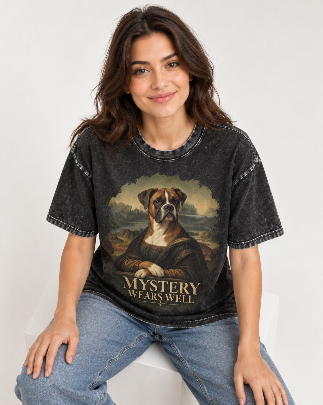 Mystery Wears Well Boxer Mona Lisa Portrait Washed Tee in Black, worn by a seated model