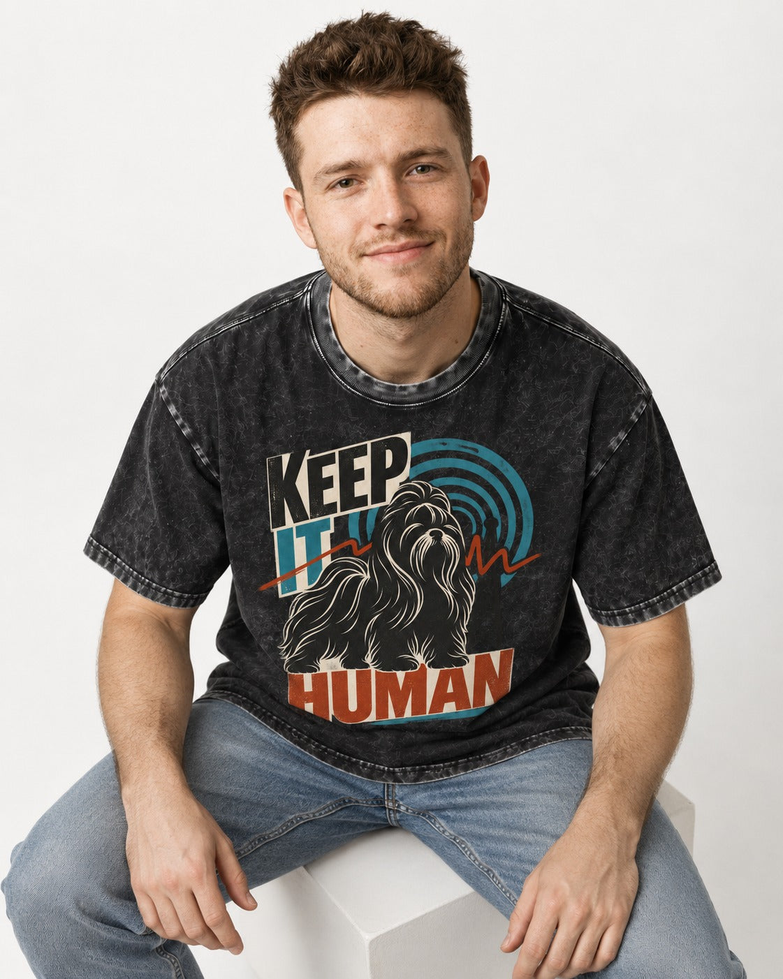 Shih Tzu Keep It Human Radio Signal Graphic Washed Tee in Black, worn by a seated model