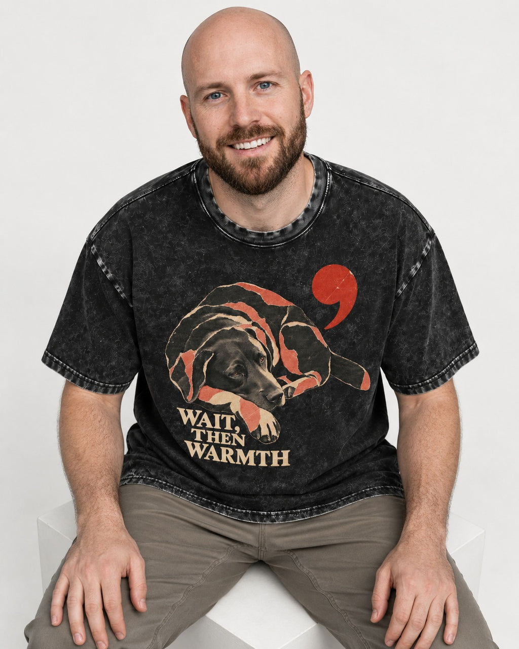 Labrador Retriever Wait Then Warmth Blanket Pause Graphic Washed Tee in Black, worn by a seated model