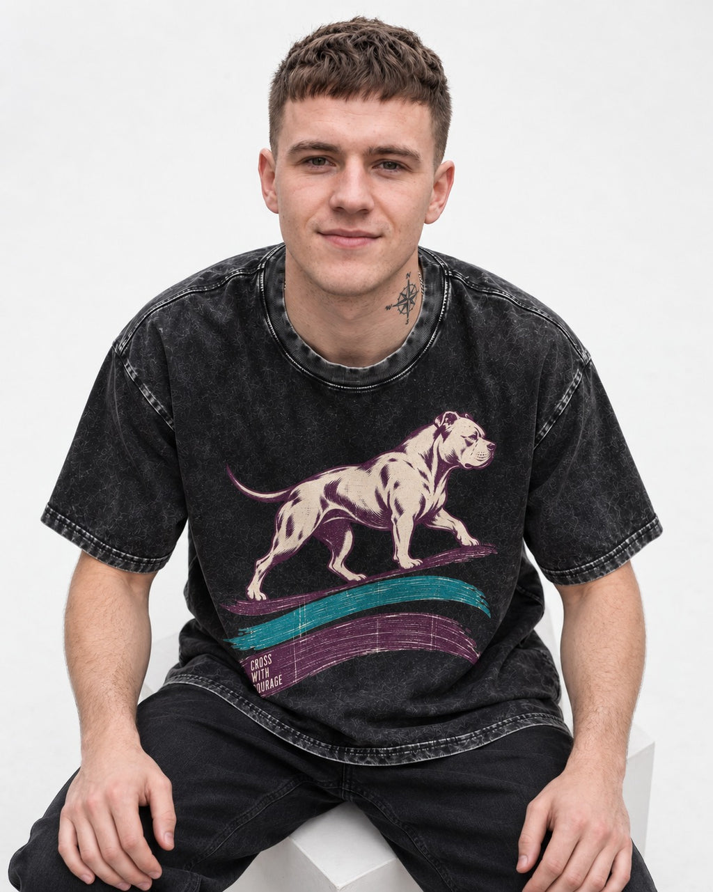 Pitbull Cross with Courage Brushstroke Graphic Washed Tee in Black, worn by a seated model