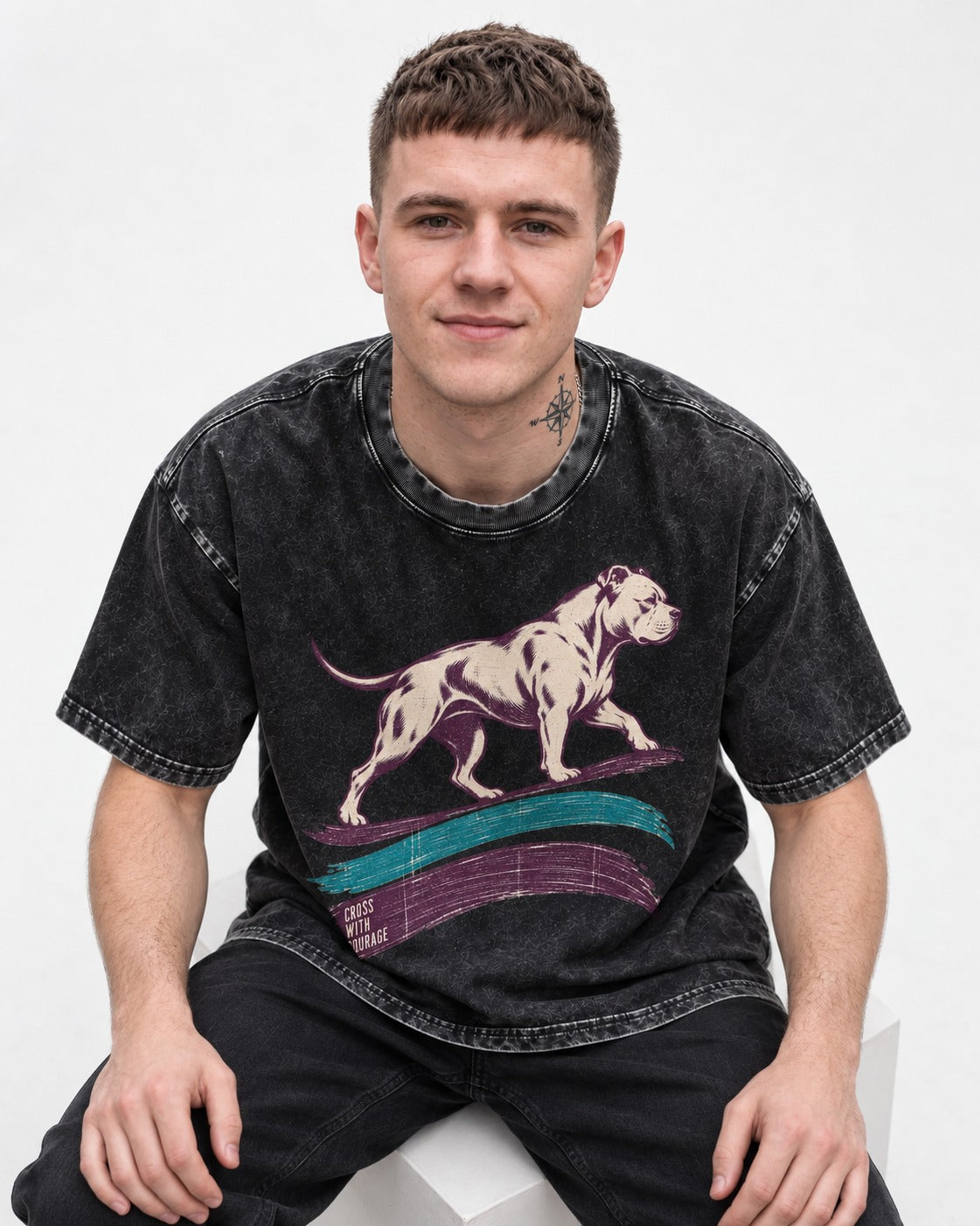 Pitbull Cross with Courage Brushstroke Graphic Washed Tee in Black, worn by a seated model
