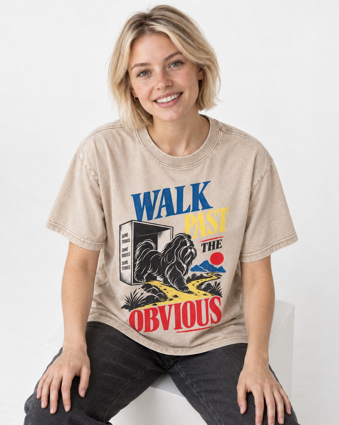 Shih Tzu Walk Past the Obvious Washed Tee in Apricot, worn by a seated model