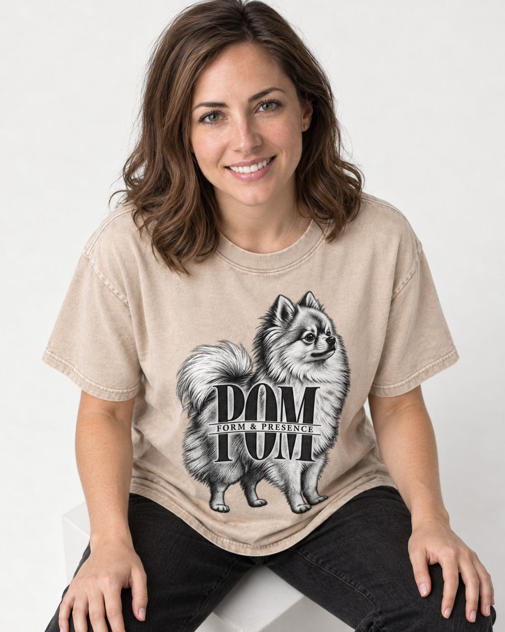 Pomeranian Form and Presence Monogram Graphic Washed Tee in Apricot, worn by a seated model