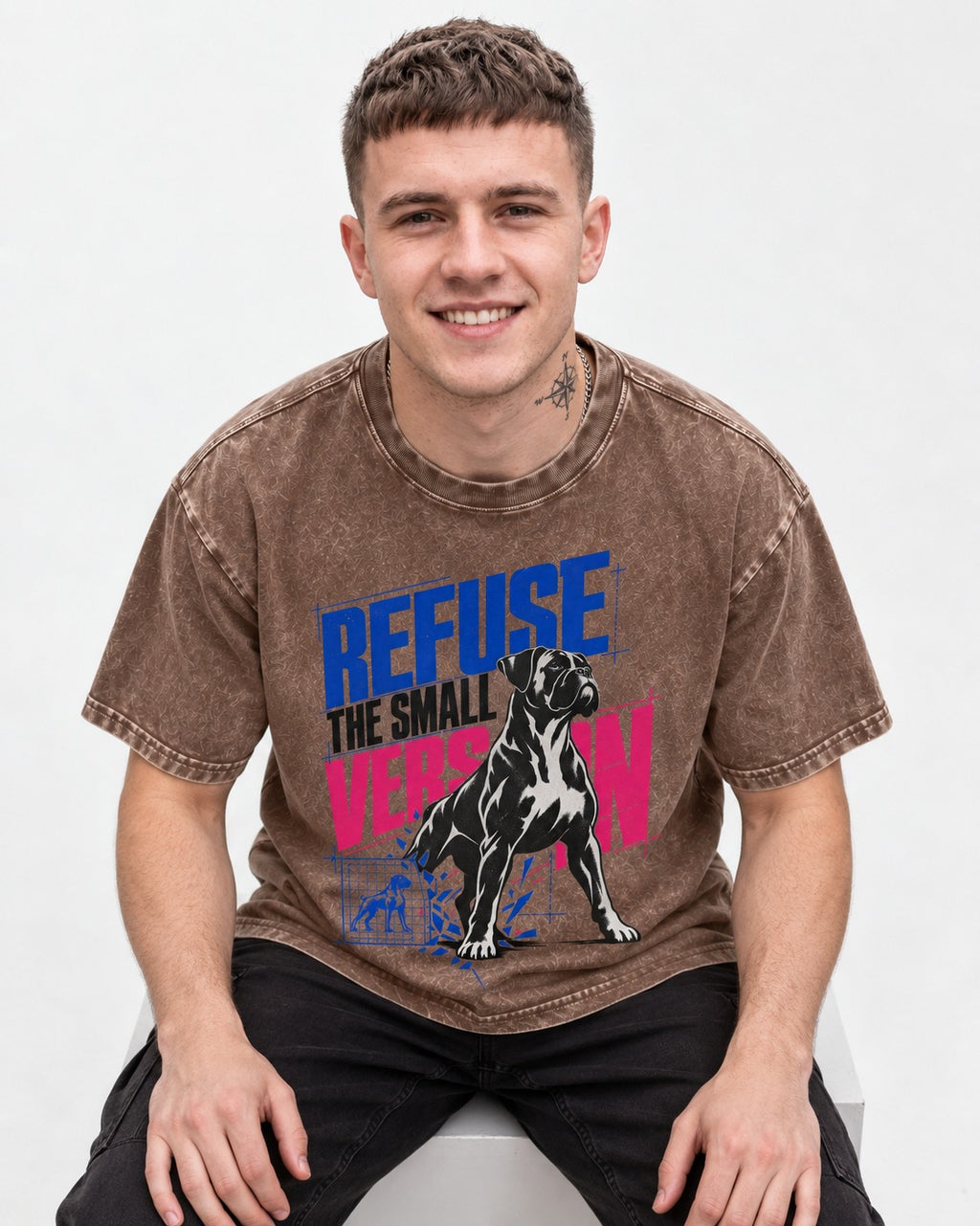Boxer Refuse the Small Version Washed Tee in Coffee, worn by a seated model
