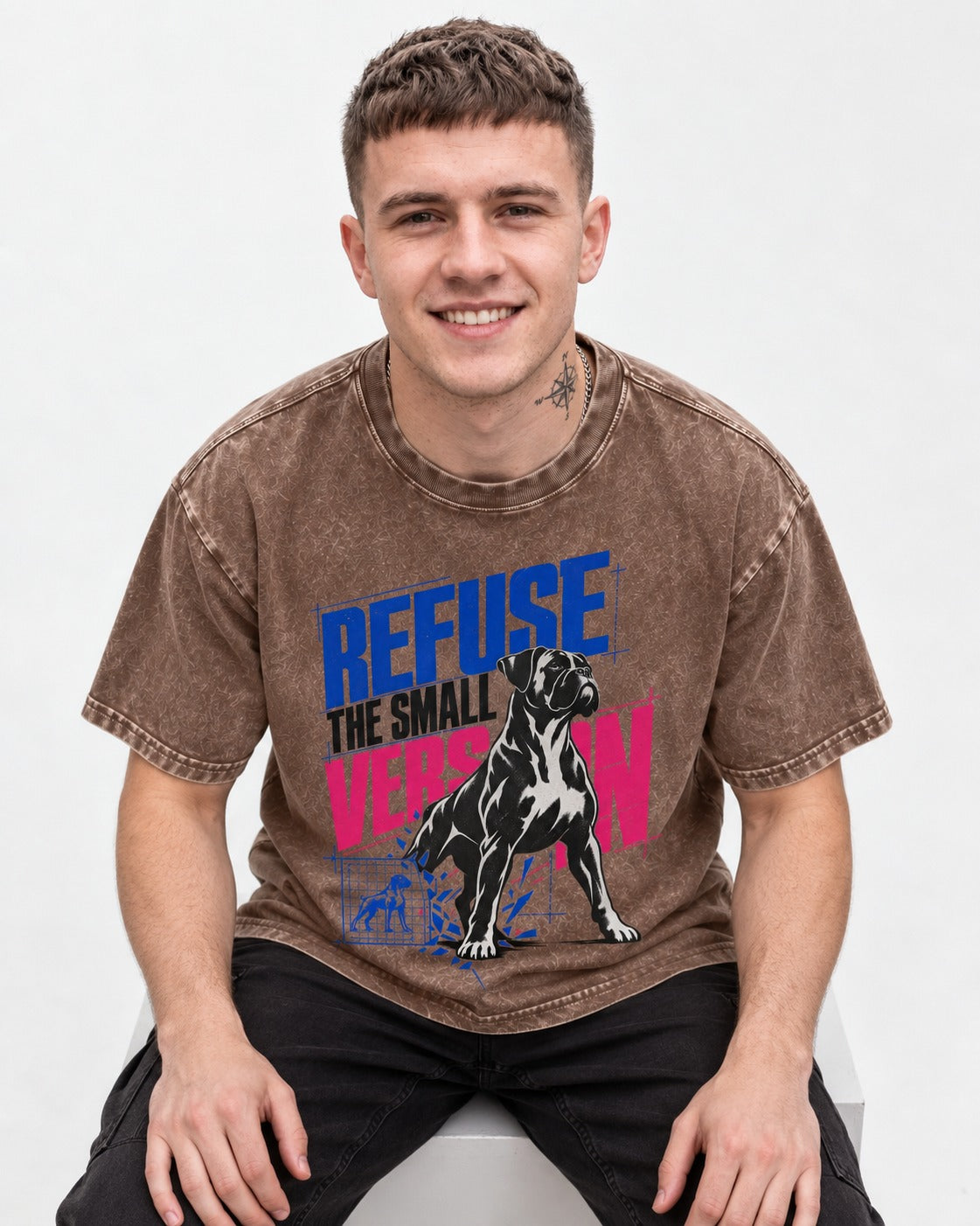 Boxer Refuse the Small Version Washed Tee in Coffee, worn by a seated model