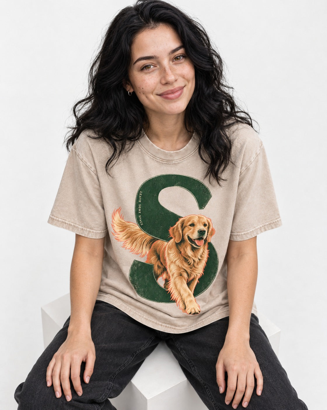 Golden Retriever Leave Some Space Monogram Graphic Washed Tee in Apricot, worn by a seated model