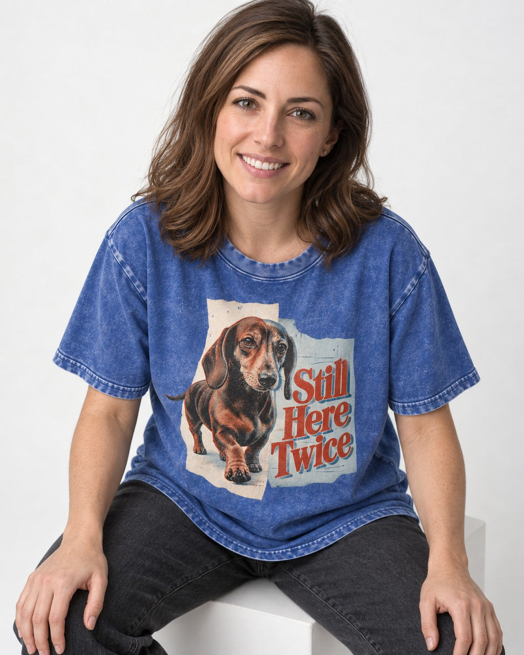 Dachshund Still Here Twice Torn Paper Graphic Washed Tee in Royal Blue, worn by a seated model
