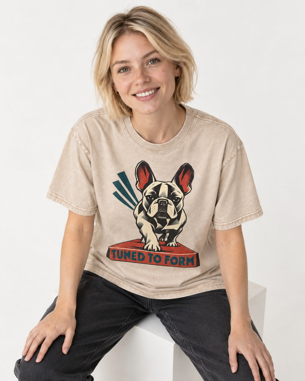 Frenchie Tuned to Form Washed Tee in Apricot, worn by a seated model