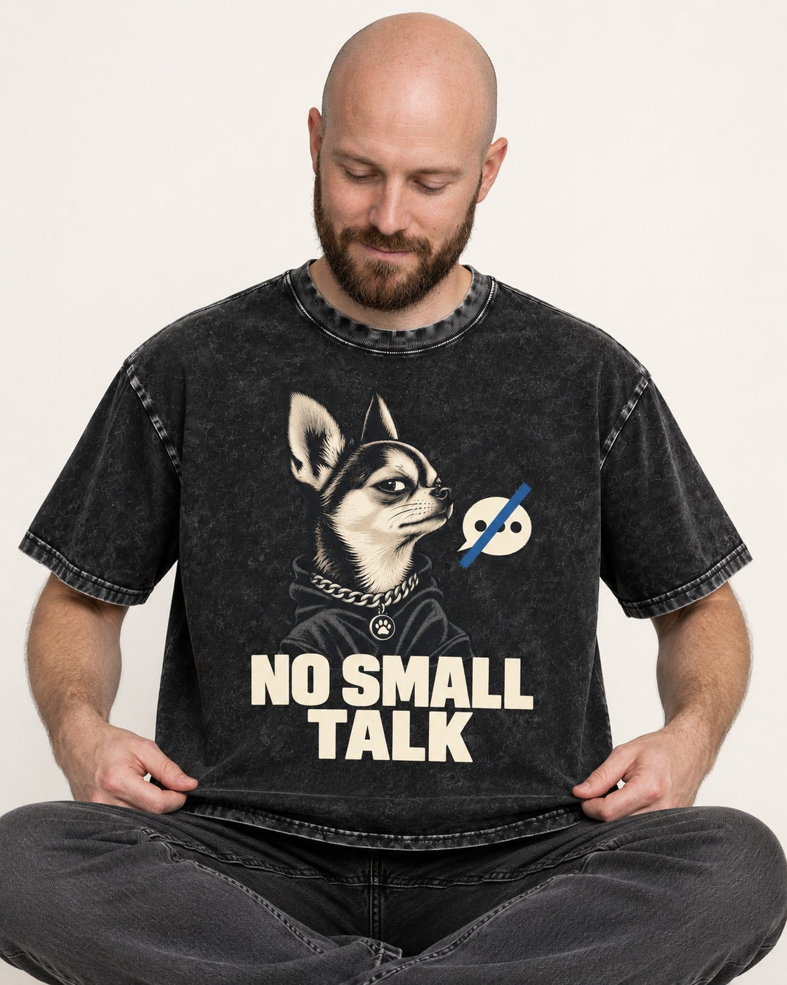 Chihuahua No Small Talk Speech-Off Portrait Graphic Washed Tee in Black, worn by a seated model