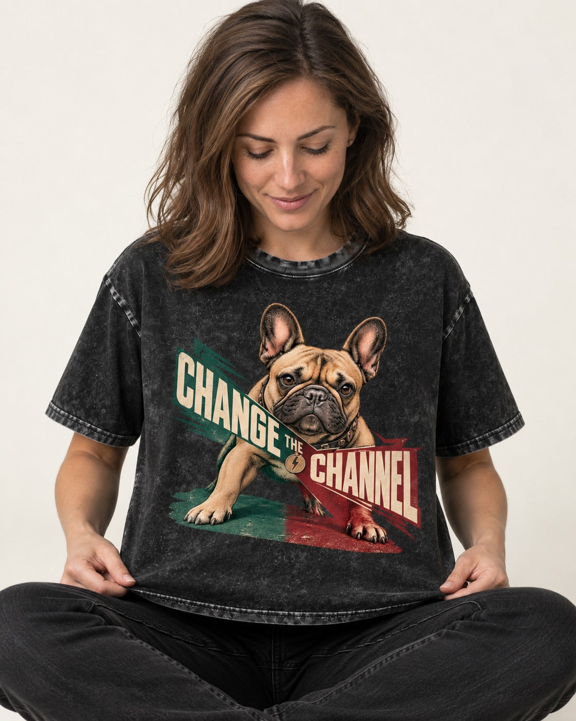 Frenchie Change the Channel Graphic Washed Tee in Black, worn by a seated model
