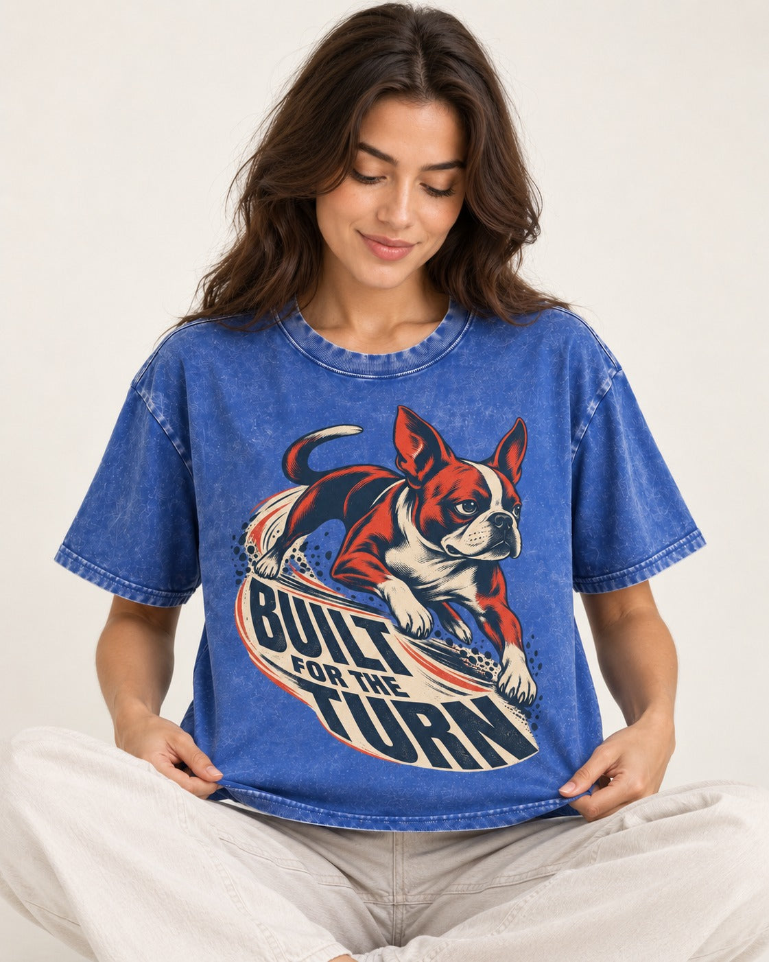 Built for the Turn Boston Terrier Washed Tee in Royal Blue, worn by a seated model