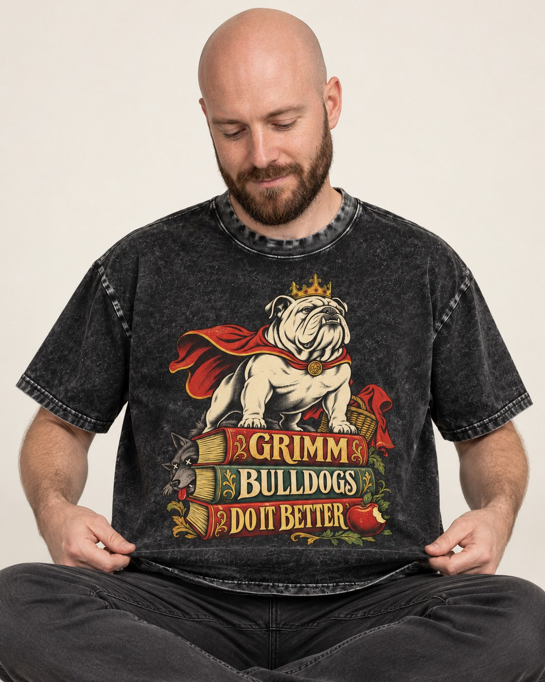 English Bulldog Grimm Bulldogs Do It Better Storybook Graphic Washed Tee in Black, worn by a seated model