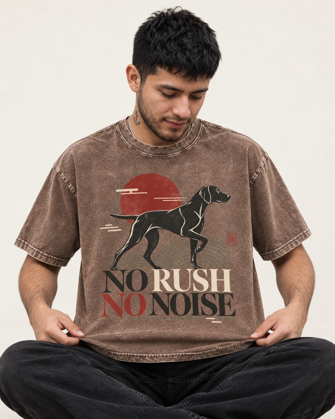 German Shorthaired Pointer No Rush No Noise Sunset Graphic Washed Tee in Coffee, worn by a seated model