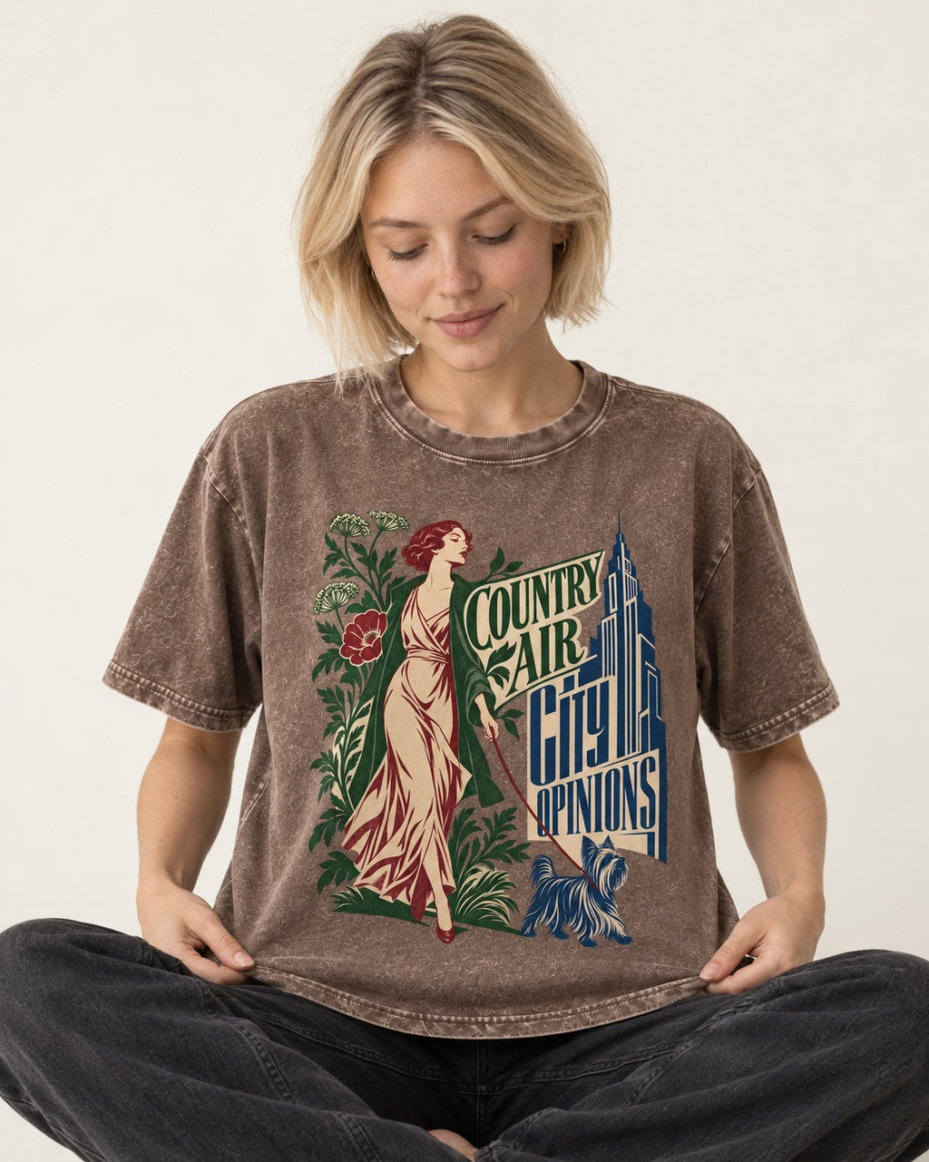 Yorkshire Terrier Country Air City Opinions Botanical Graphic Washed Tee in Coffee, worn by a seated model