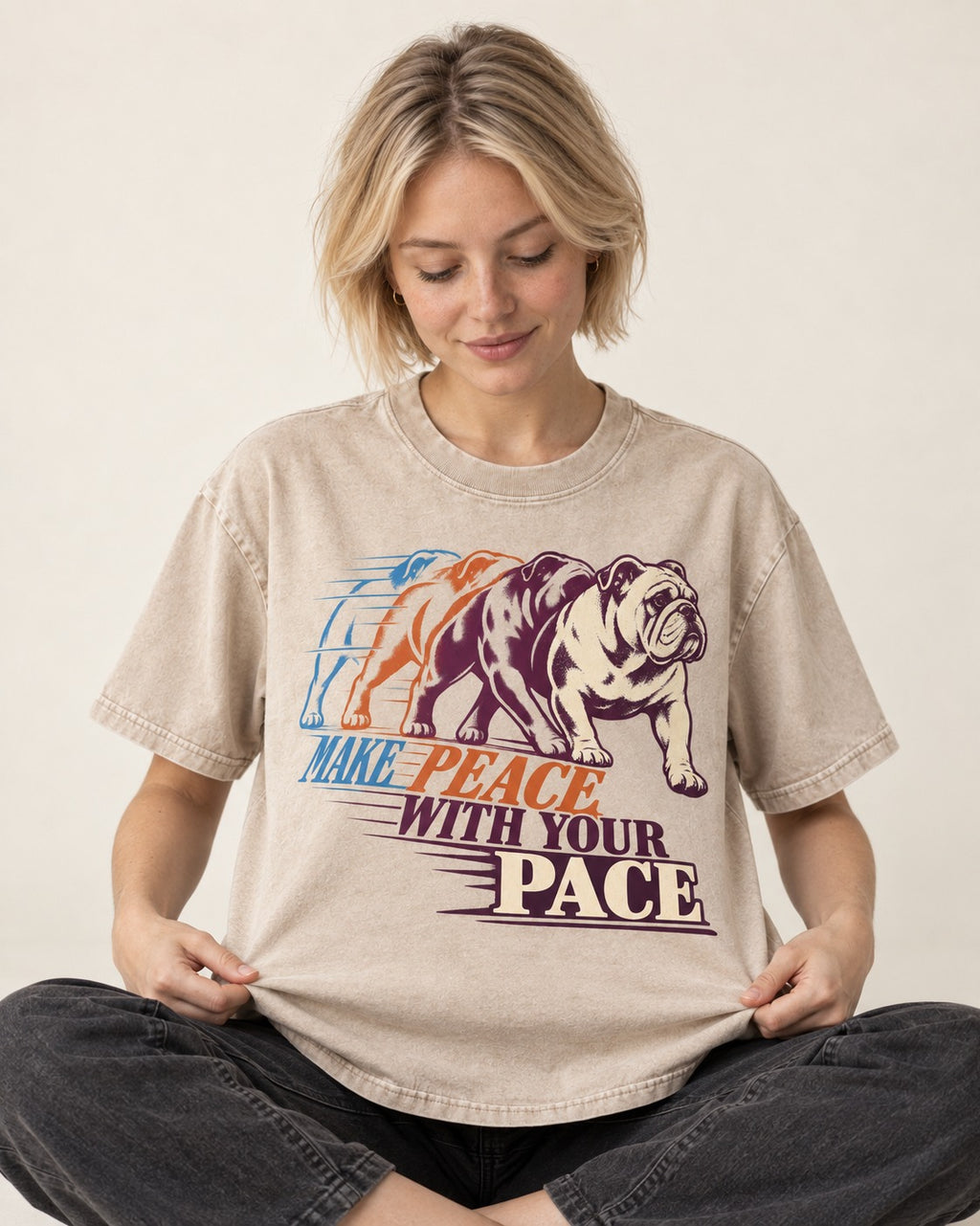 English Bulldog Peace with Your Pace Washed Tee in Apricot, worn by a seated model