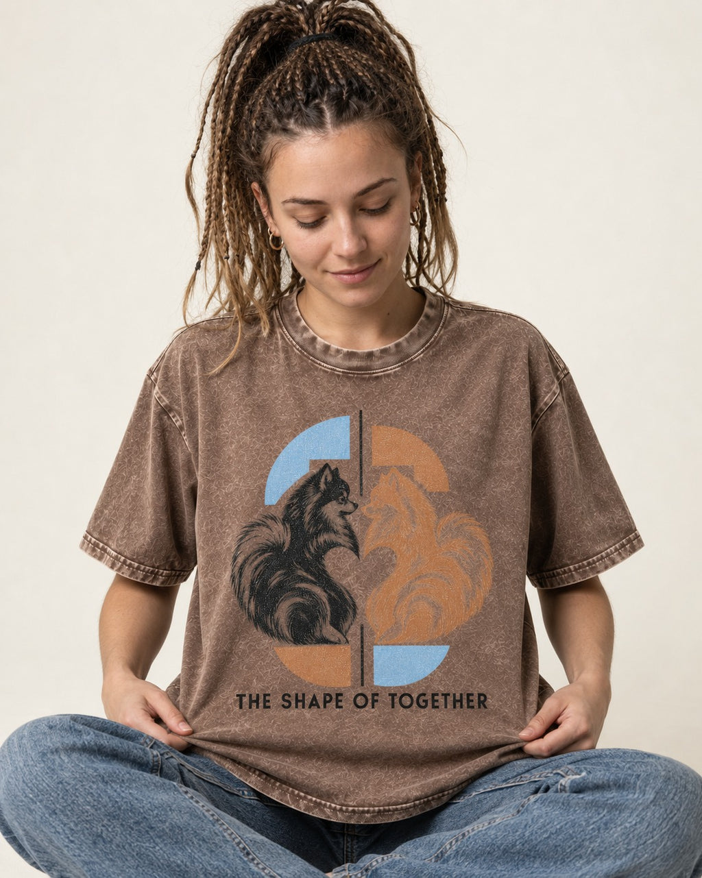 Pomeranian The Shape of Together Washed Tee in Coffee, worn by a seated model