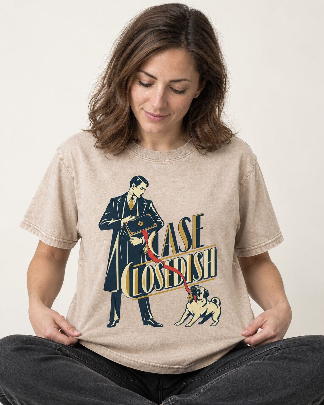 Case Closedish Pug Washed Tee in Apricot, worn by a seated model