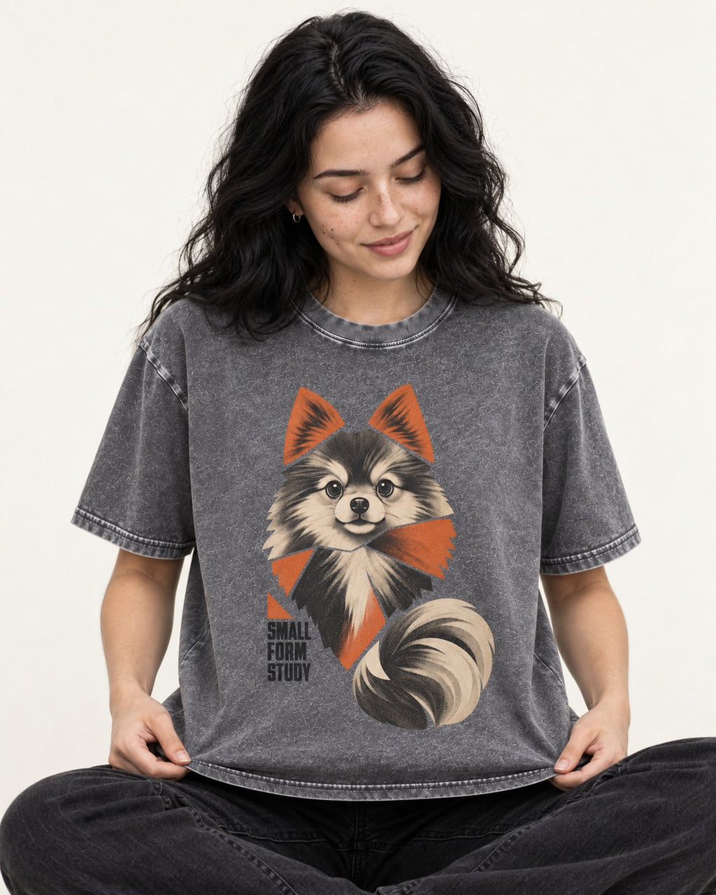 Pomeranian Small Form Study Washed Tee in Gray, worn by a seated model