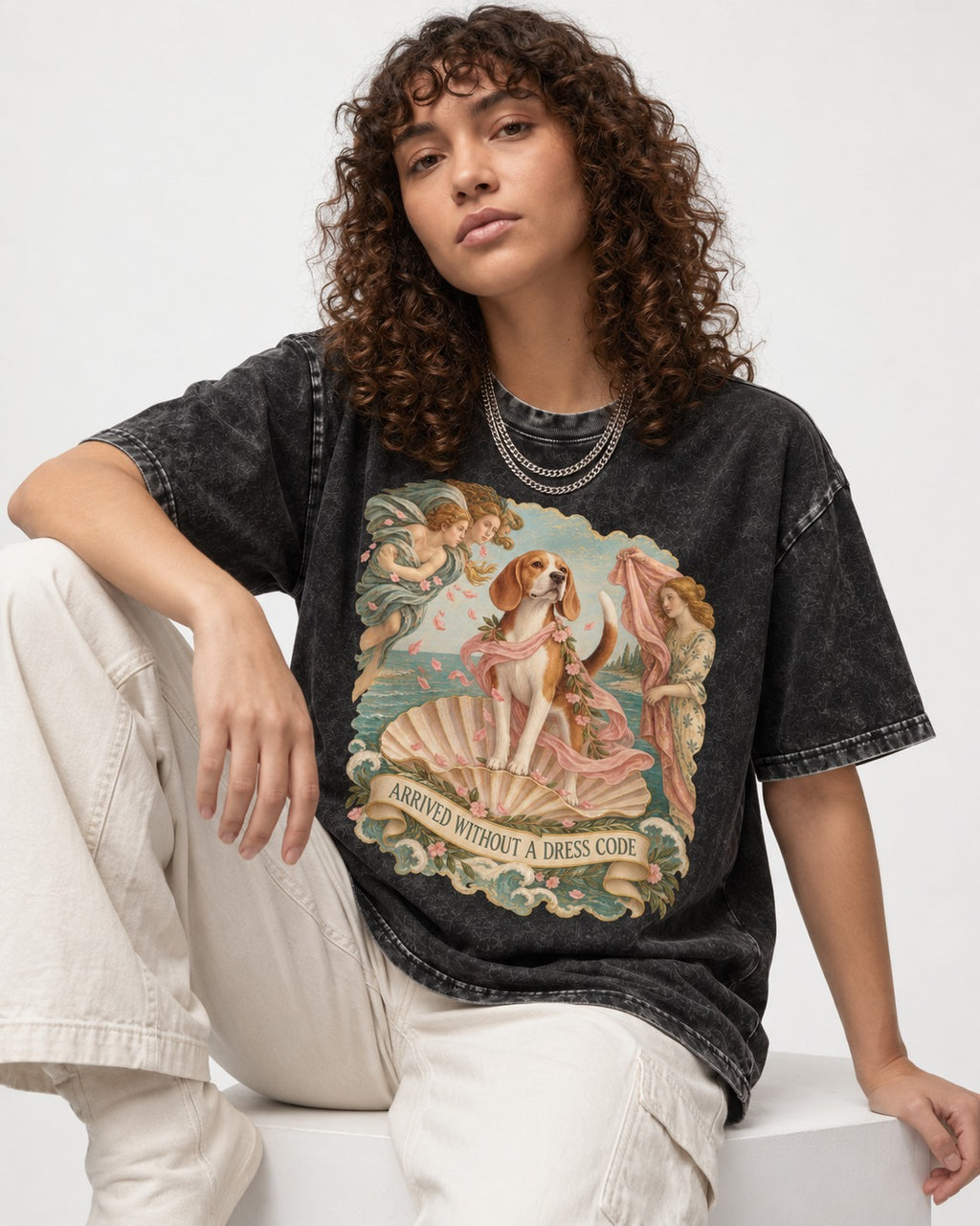Beagle Arrived Without A Dress Code Washed Tee in Black, worn by a seated model