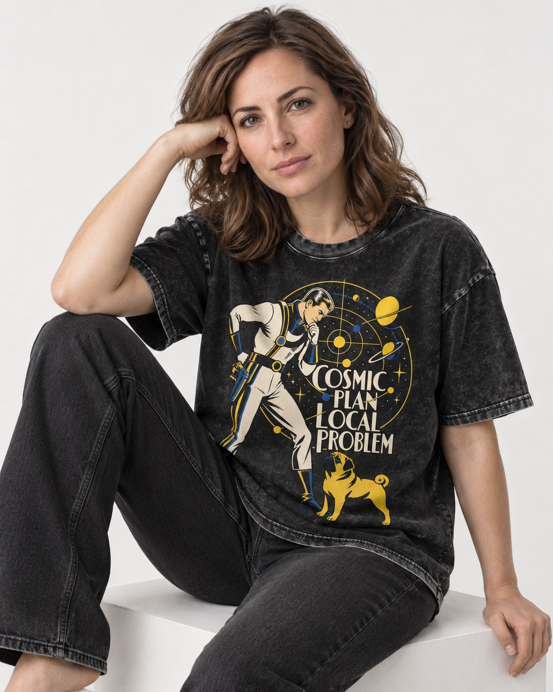 Pug Cosmic Plan Local Problem Astronaut Graphic Washed Tee in Black, worn by a seated model