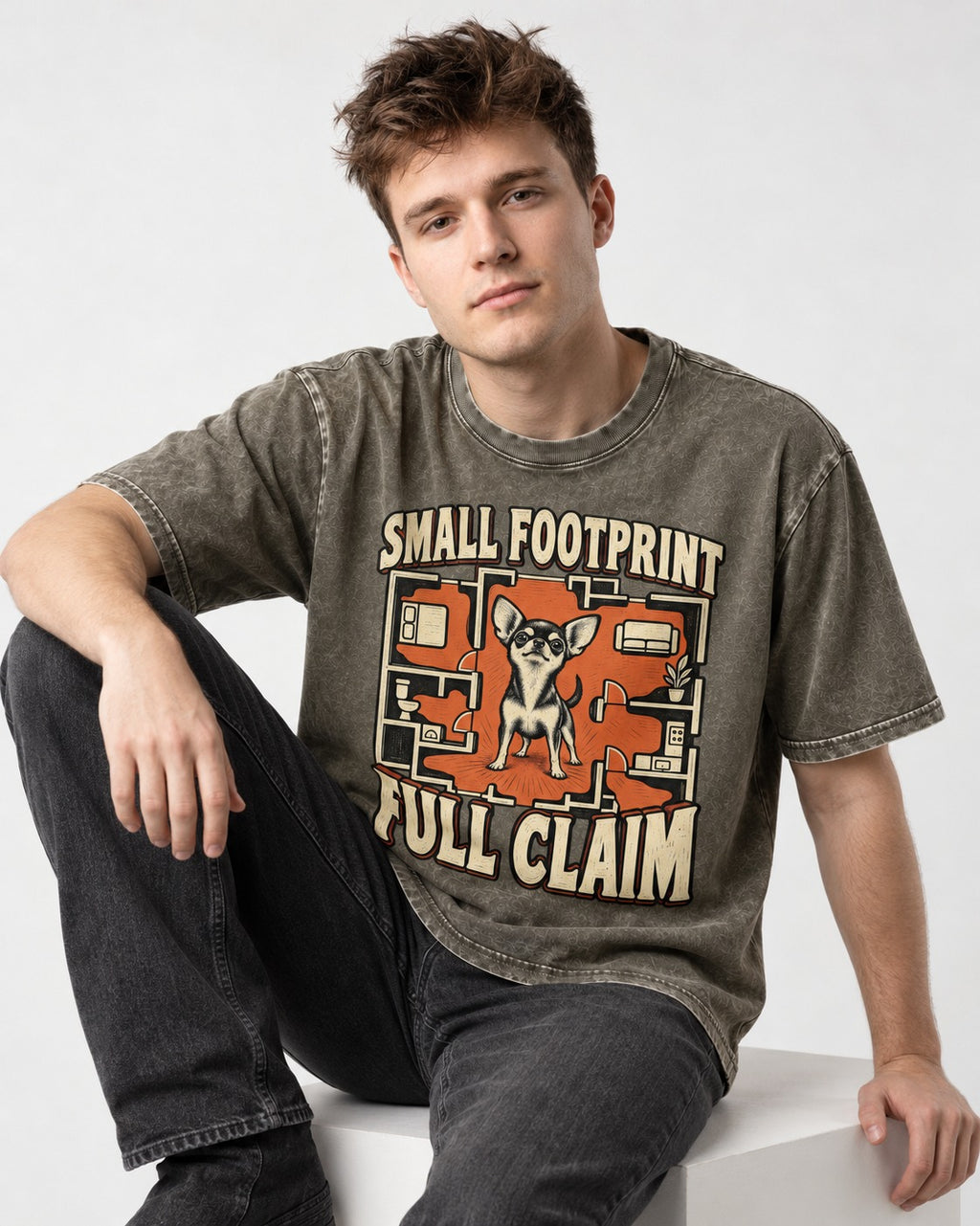 Chihuahua Small Footprint Full Claim Floor Plan Graphic Washed Tee in Army Green, worn by a seated model