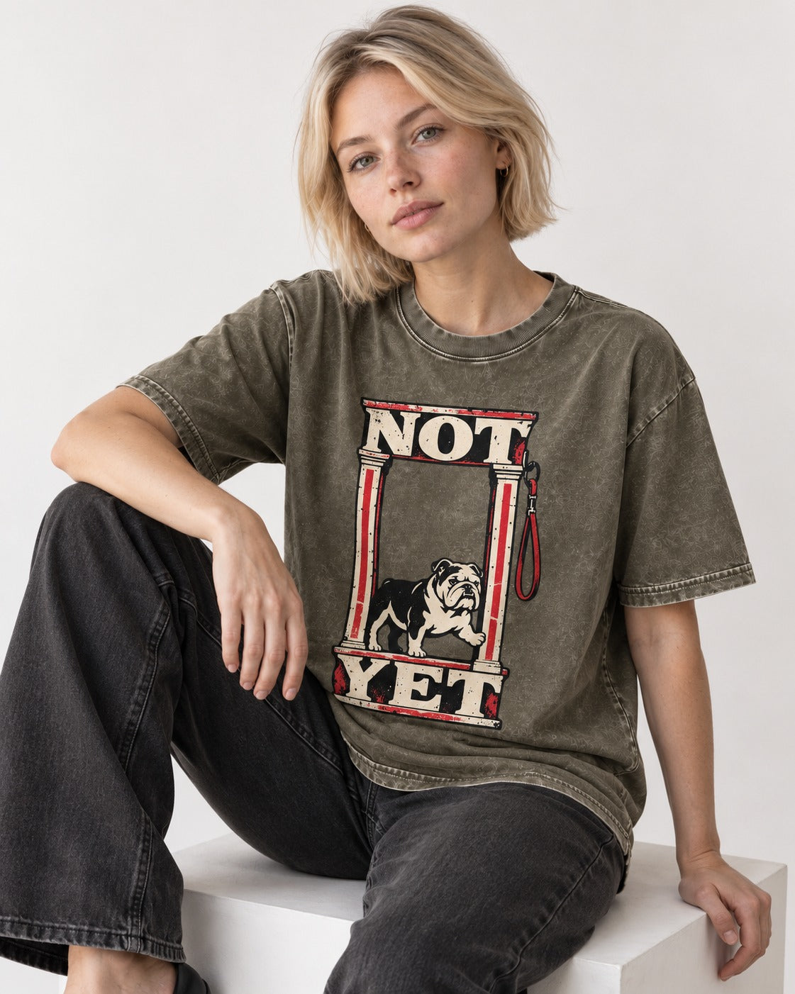 English Bulldog Not Yet Doorway Graphic Washed Tee in Army Green, worn by a seated model