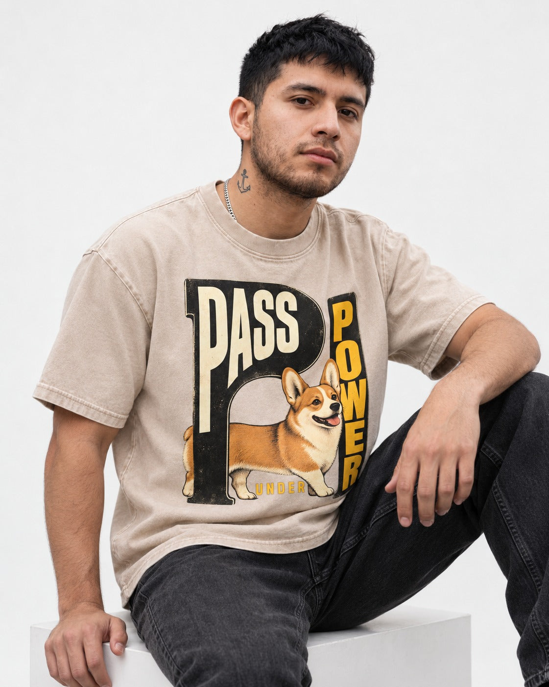 Corgi Power Washed Tee in Apricot, worn by a seated model