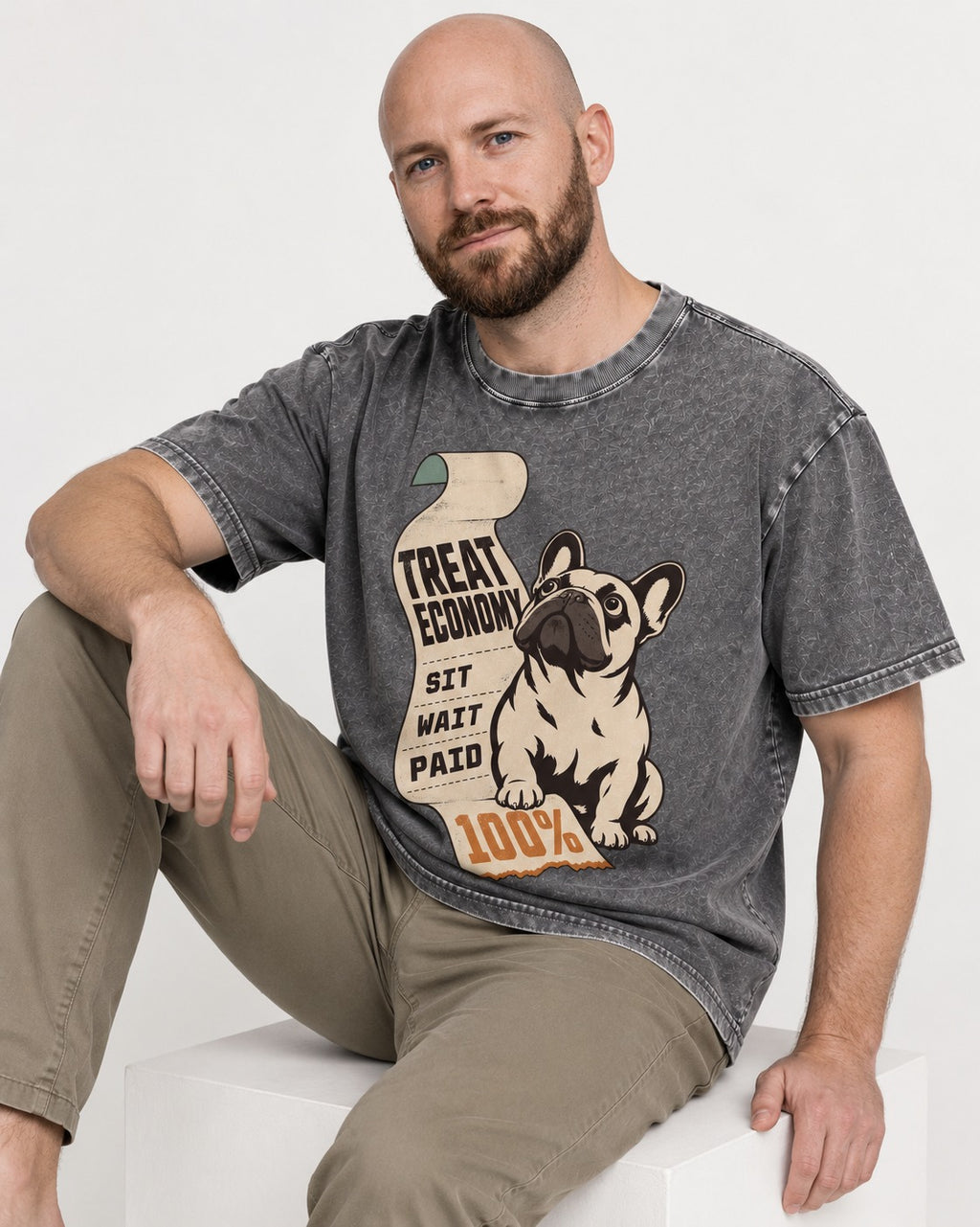 Frenchie Treat Economy Sit Wait Paid Receipt Graphic Washed Tee in Gray, worn by a seated model