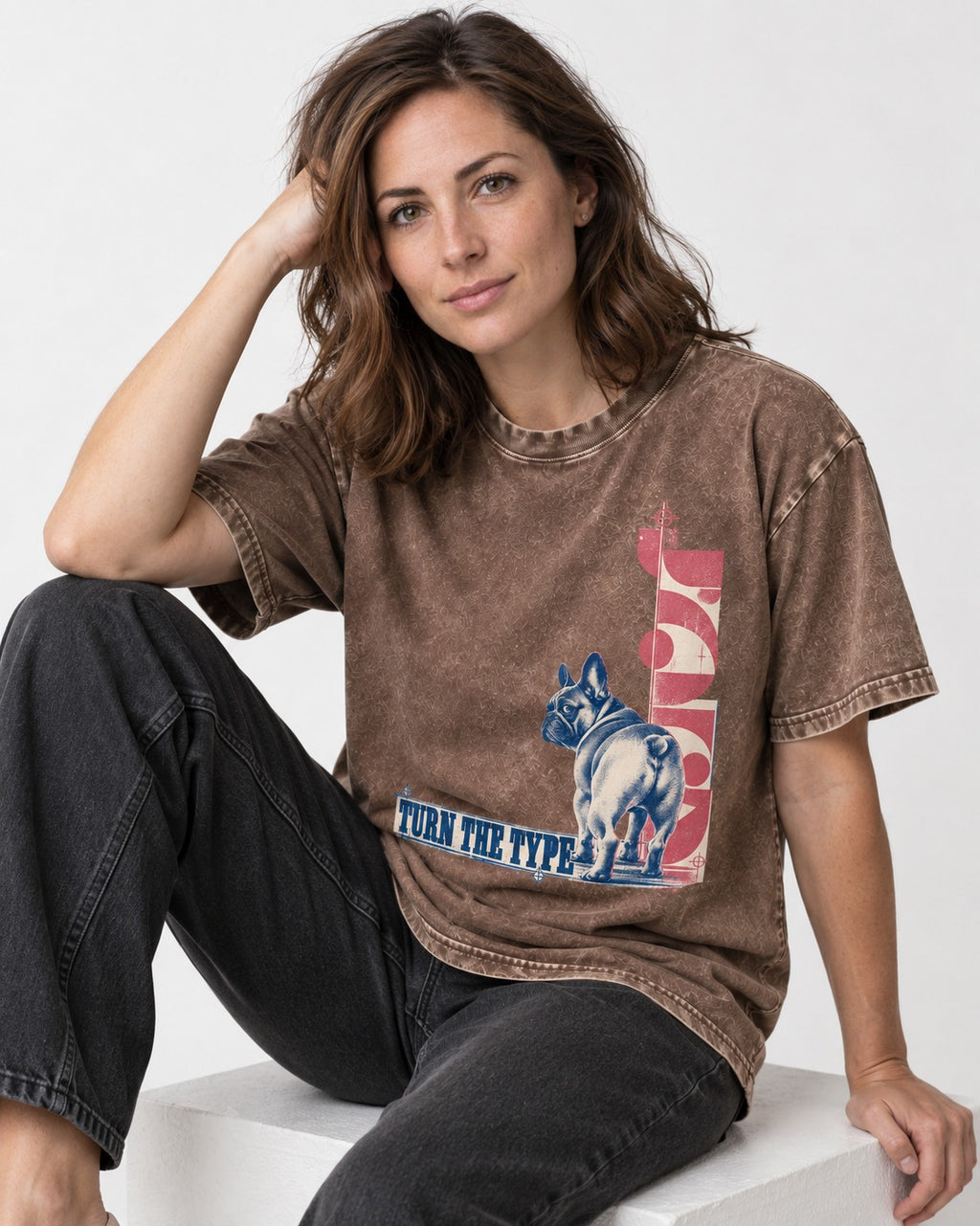 Frenchie Turn the Type Washed Tee in Coffee, worn by a seated model
