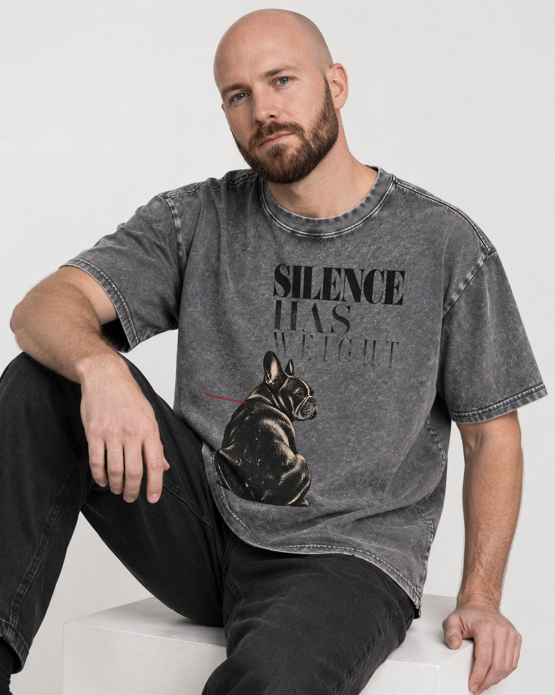 Silence Has Weight Frenchie Washed Tee in Gray, worn by a seated model