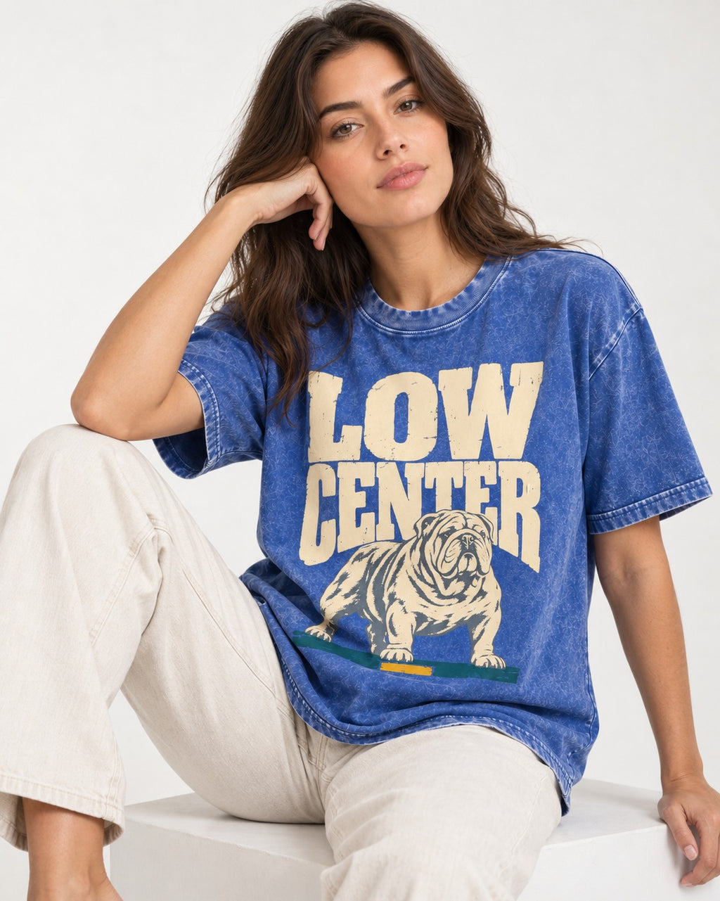English Bulldog Low Center Stance Graphic Washed Tee in Royal Blue, worn by a seated model