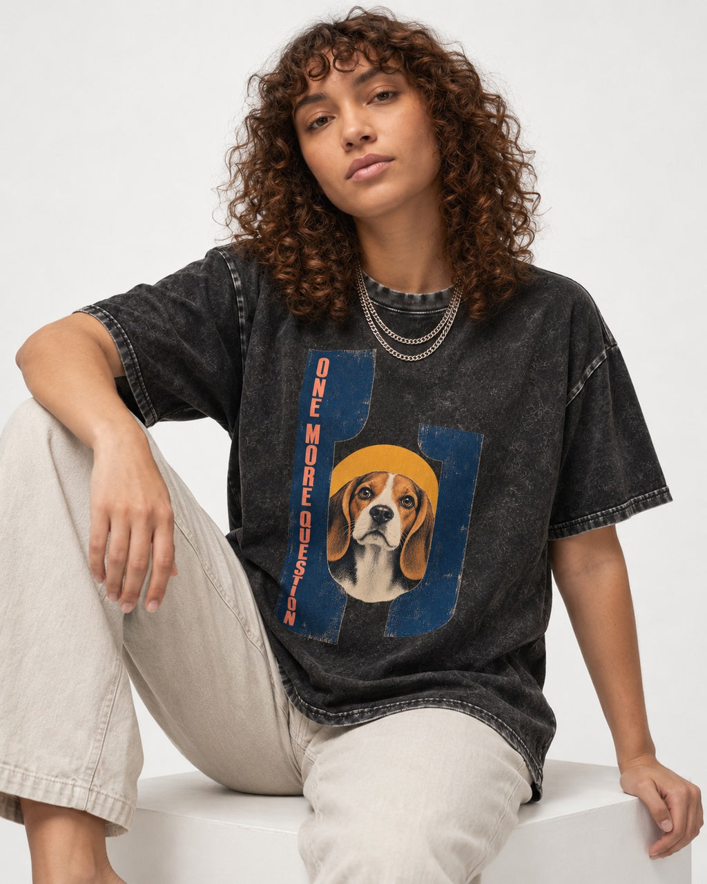One More Question Beagle Modernist Washed Tee in Black, worn by a seated model