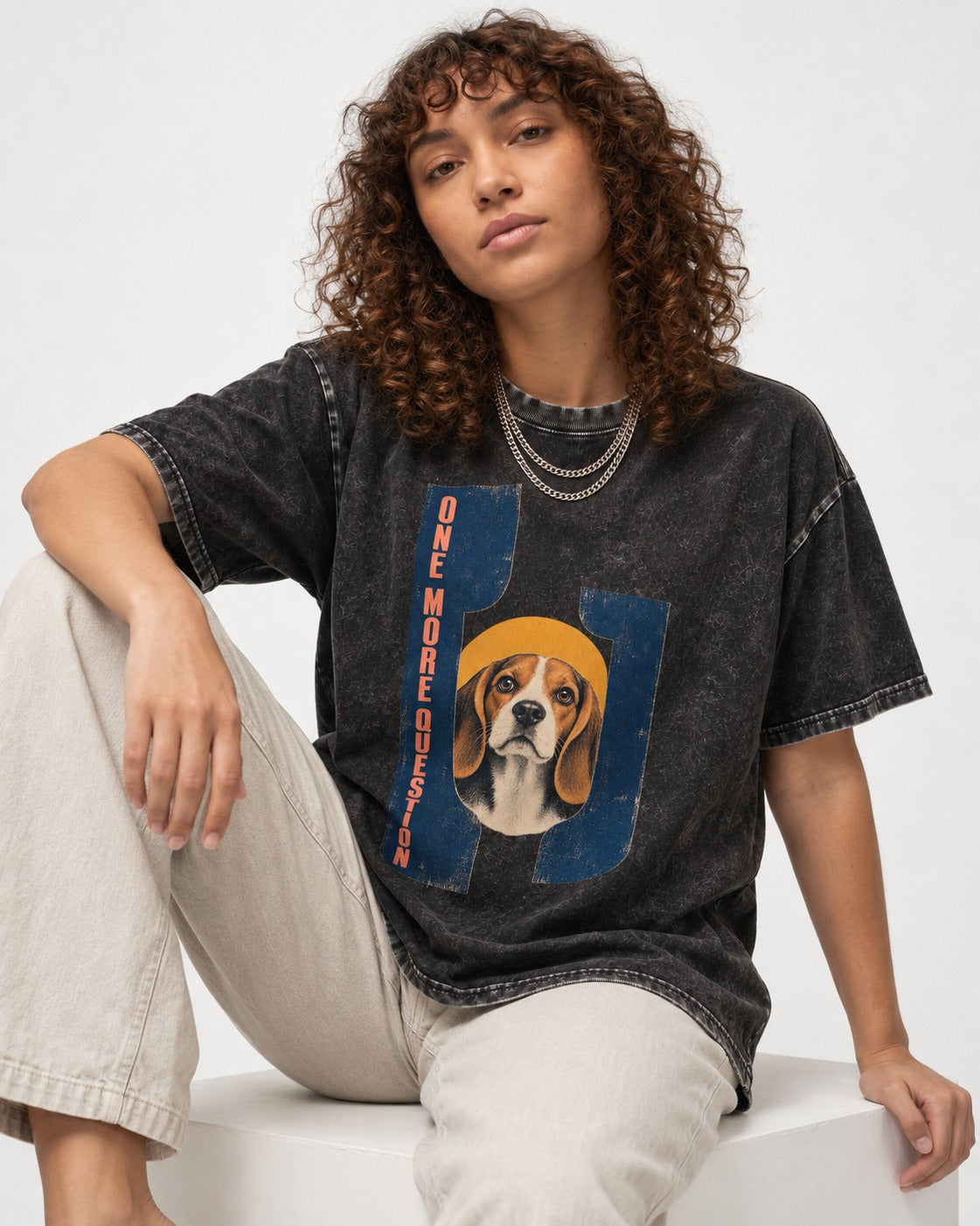 One More Question Beagle Modernist Washed Tee in Black, worn by a seated model