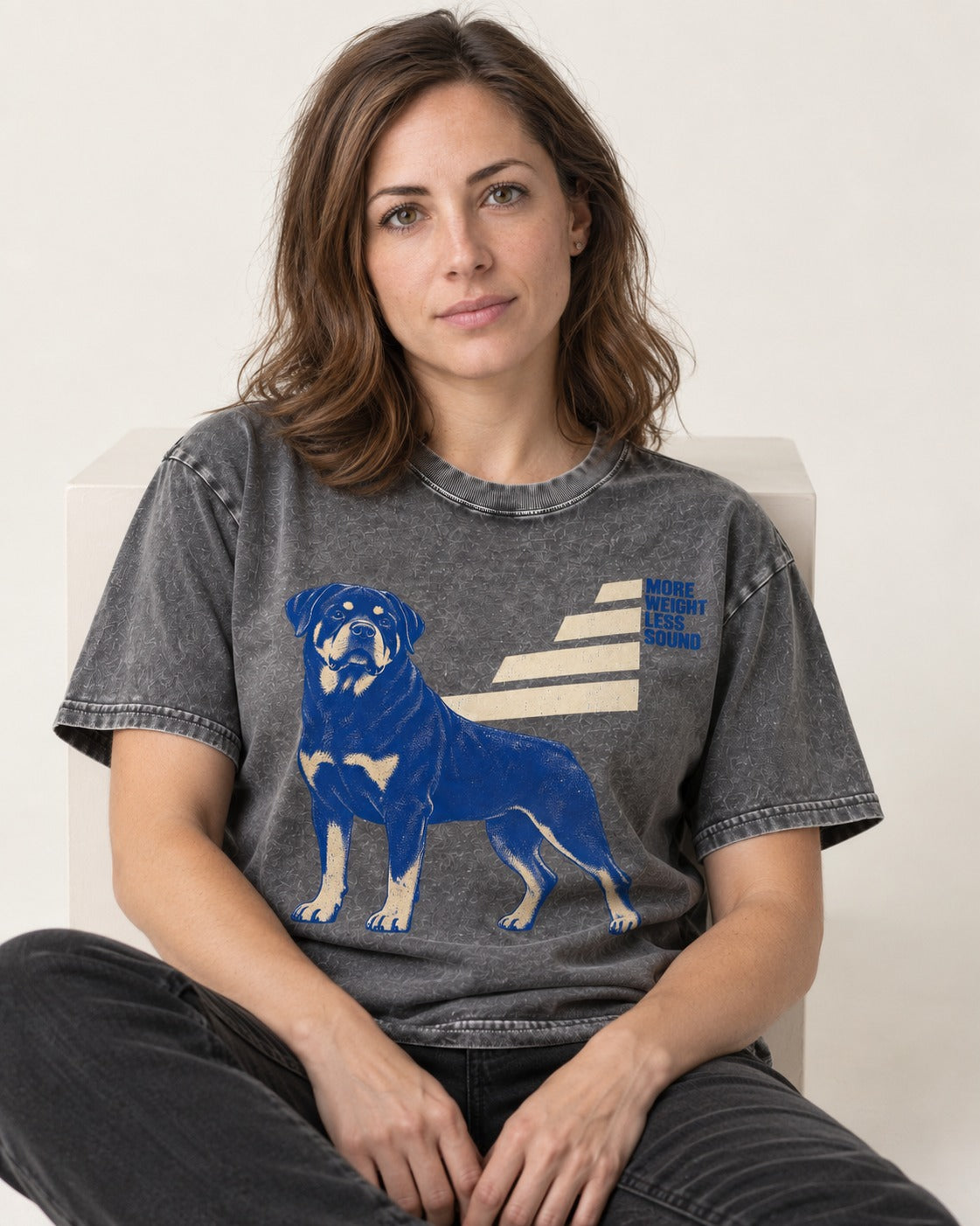 Rottweiler More Weight Less Sound Stair Step Graphic Washed Tee in Gray, worn by a seated model