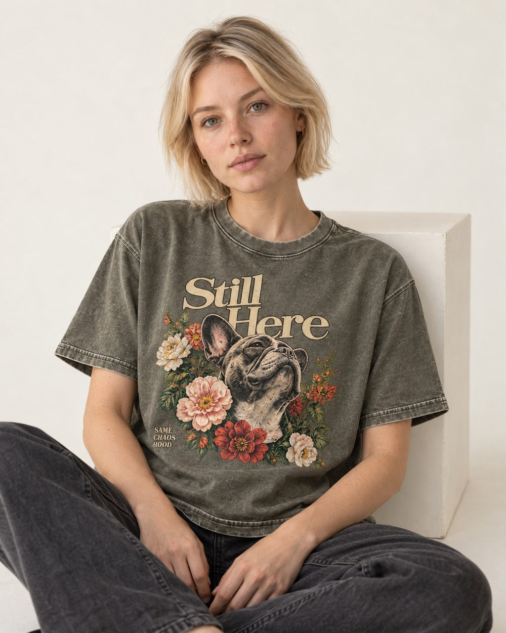 Frenchie Still Here Floral Portrait Graphic Washed Tee in Army Green, worn by a seated model