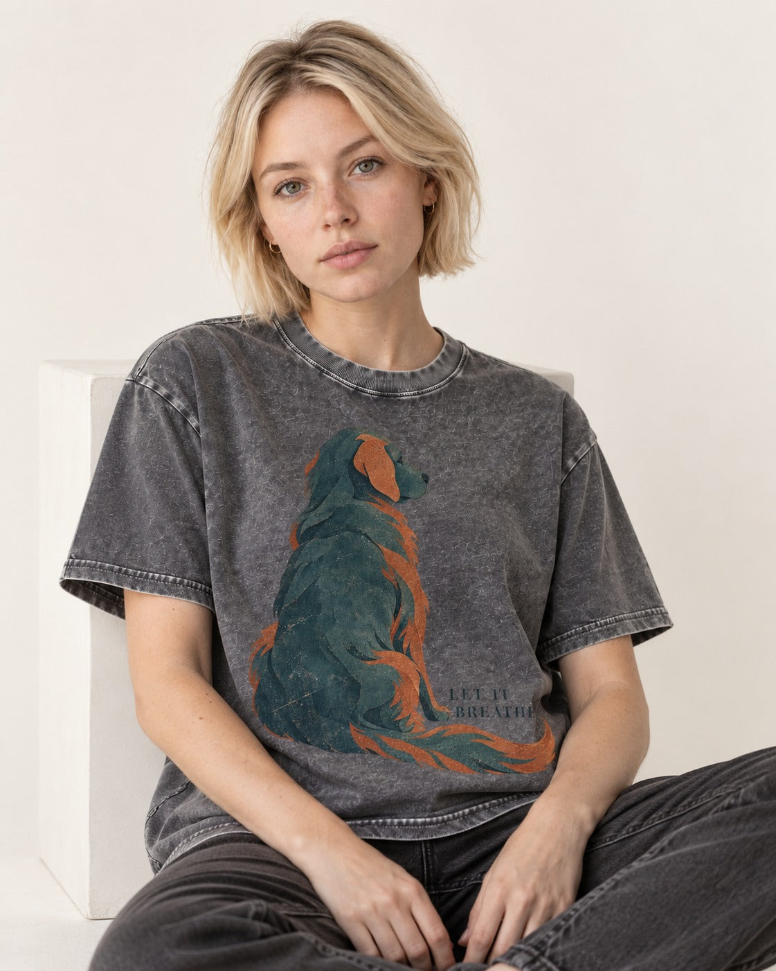 Let It Breathe Golden Retriever Washed Tee in Gray, worn by a seated model