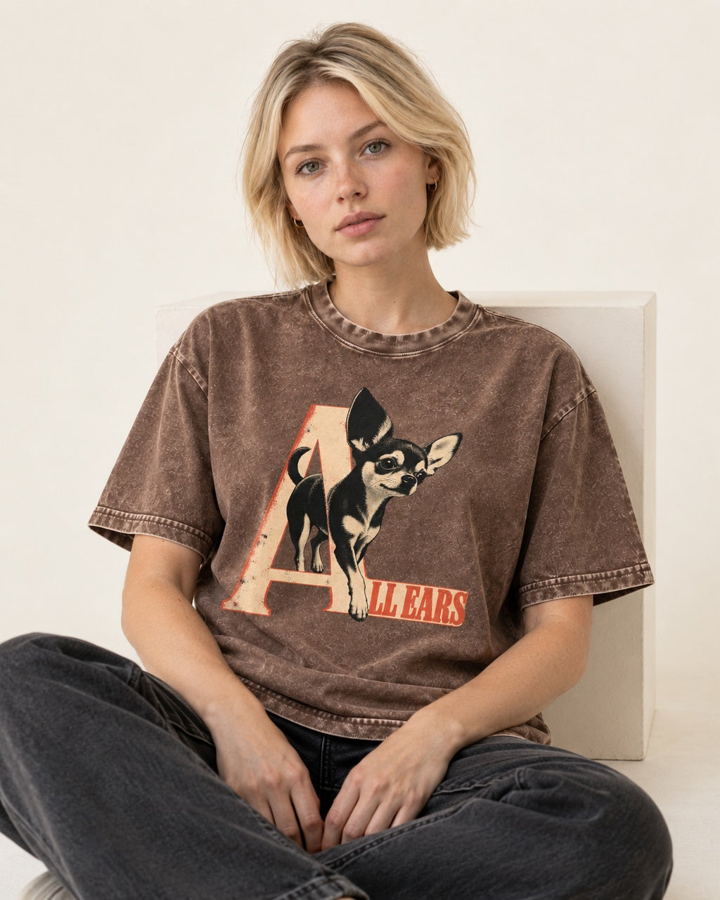 All Ears Chihuahua Washed Tee in Coffee, worn by a seated model