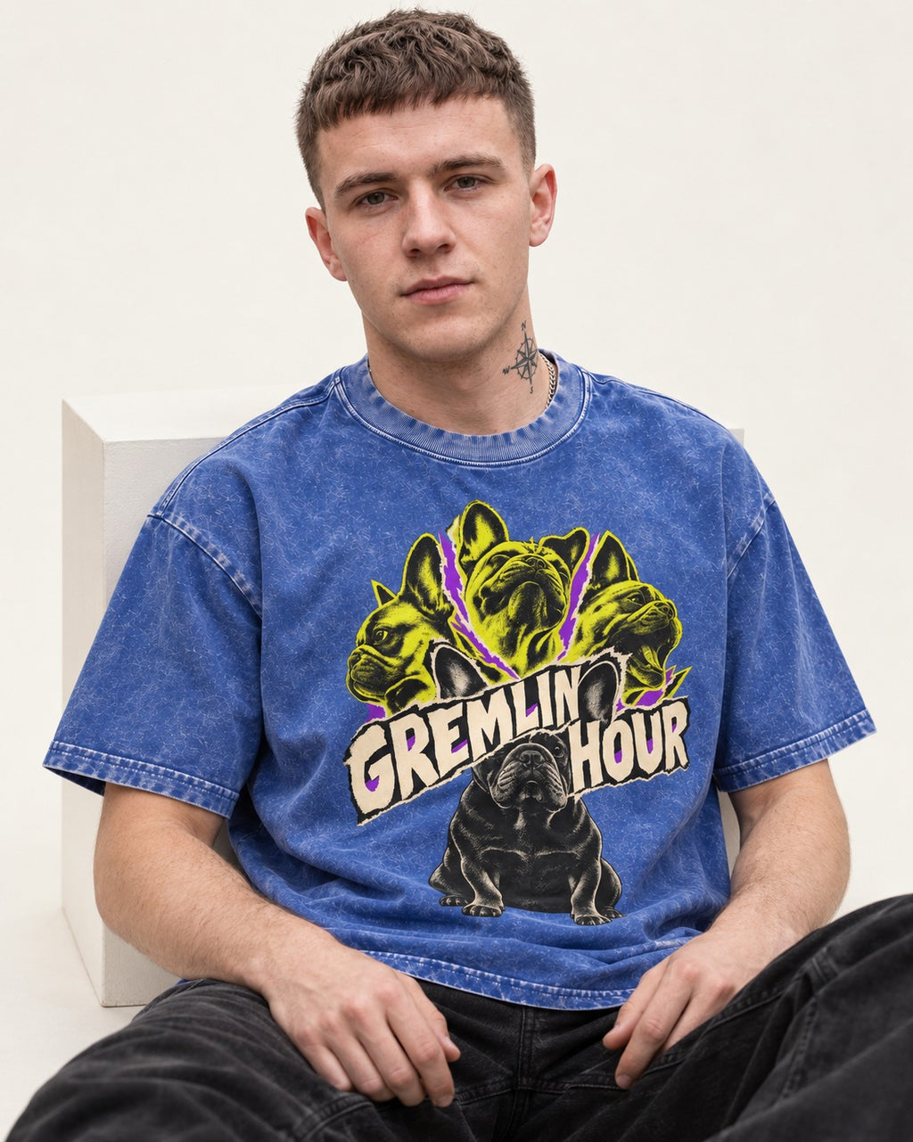 Frenchie Gremlin Hour Multi Portrait Graphic Washed Tee in Royal Blue, worn by a seated model