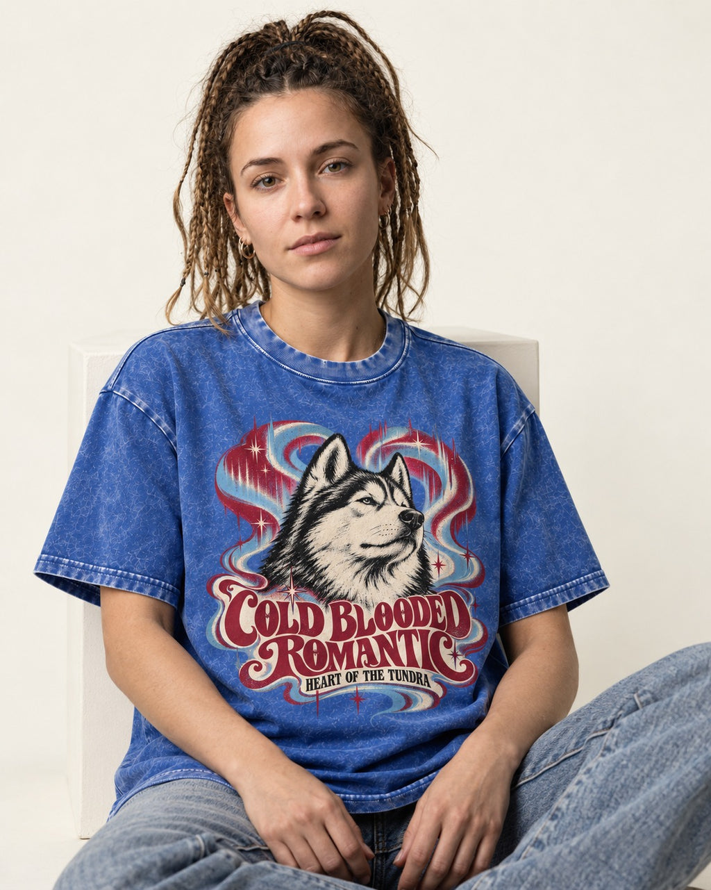 Husky Cold Blooded Romantic Heart of the Tundra Graphic Washed Tee in Royal Blue, worn by a seated model