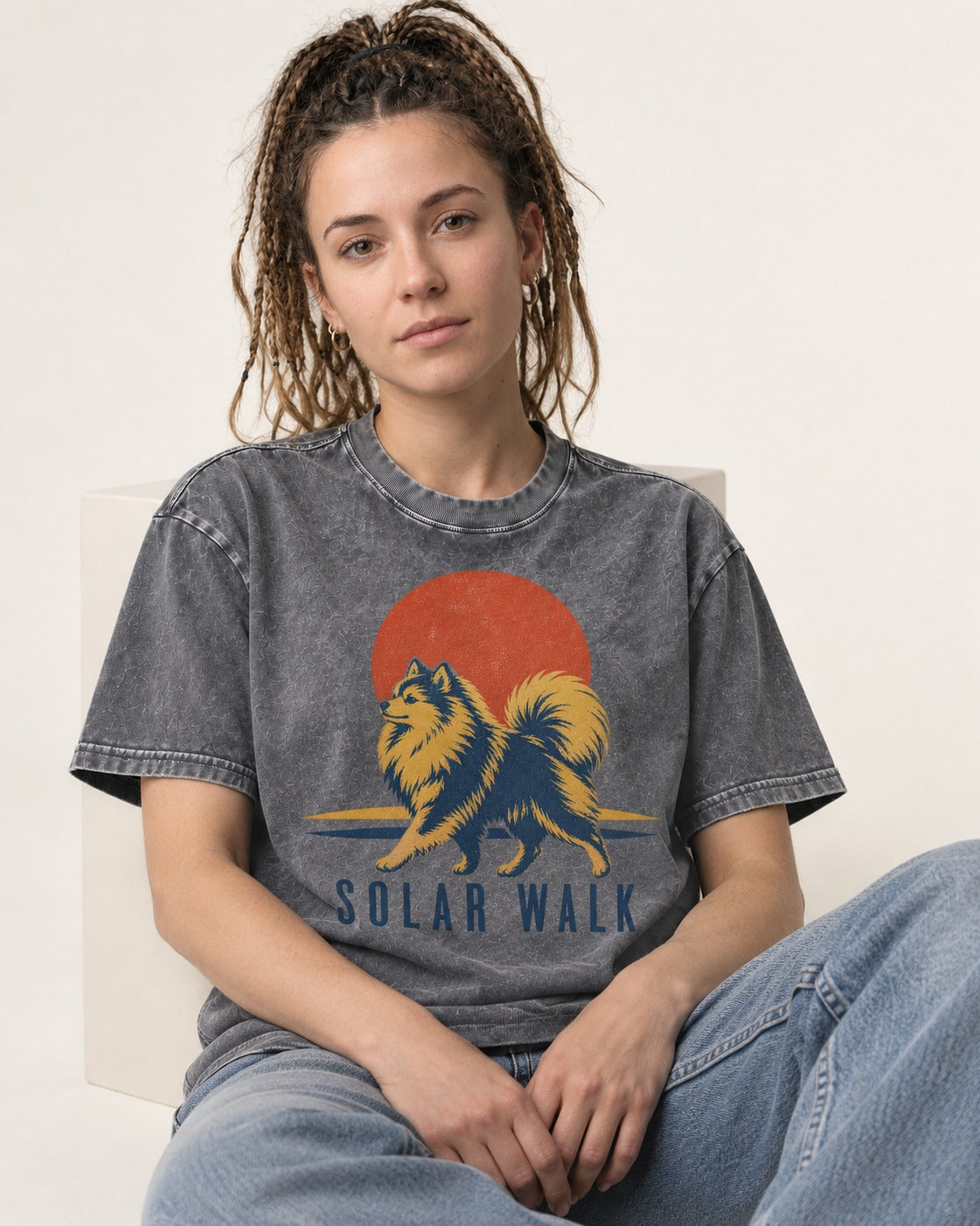 Pomeranian Solar Walk Washed Tee in Gray, worn by a seated model