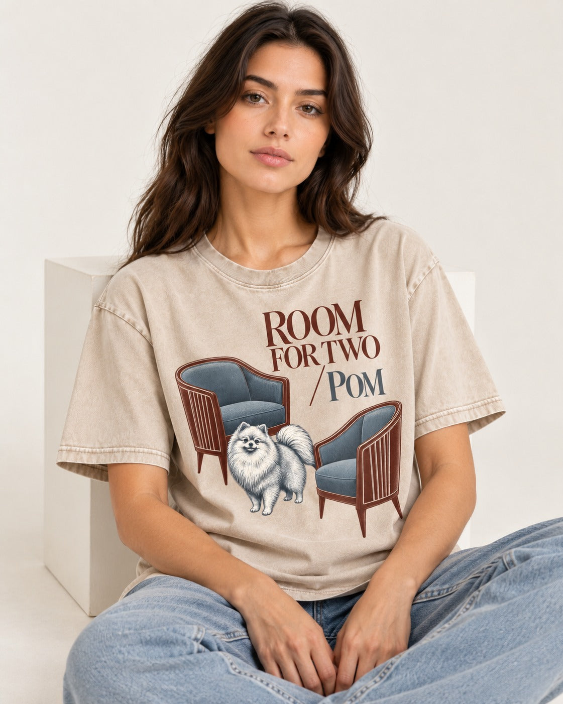 Room for Two with Pomeranian Washed Tee in Apricot, worn by a seated model