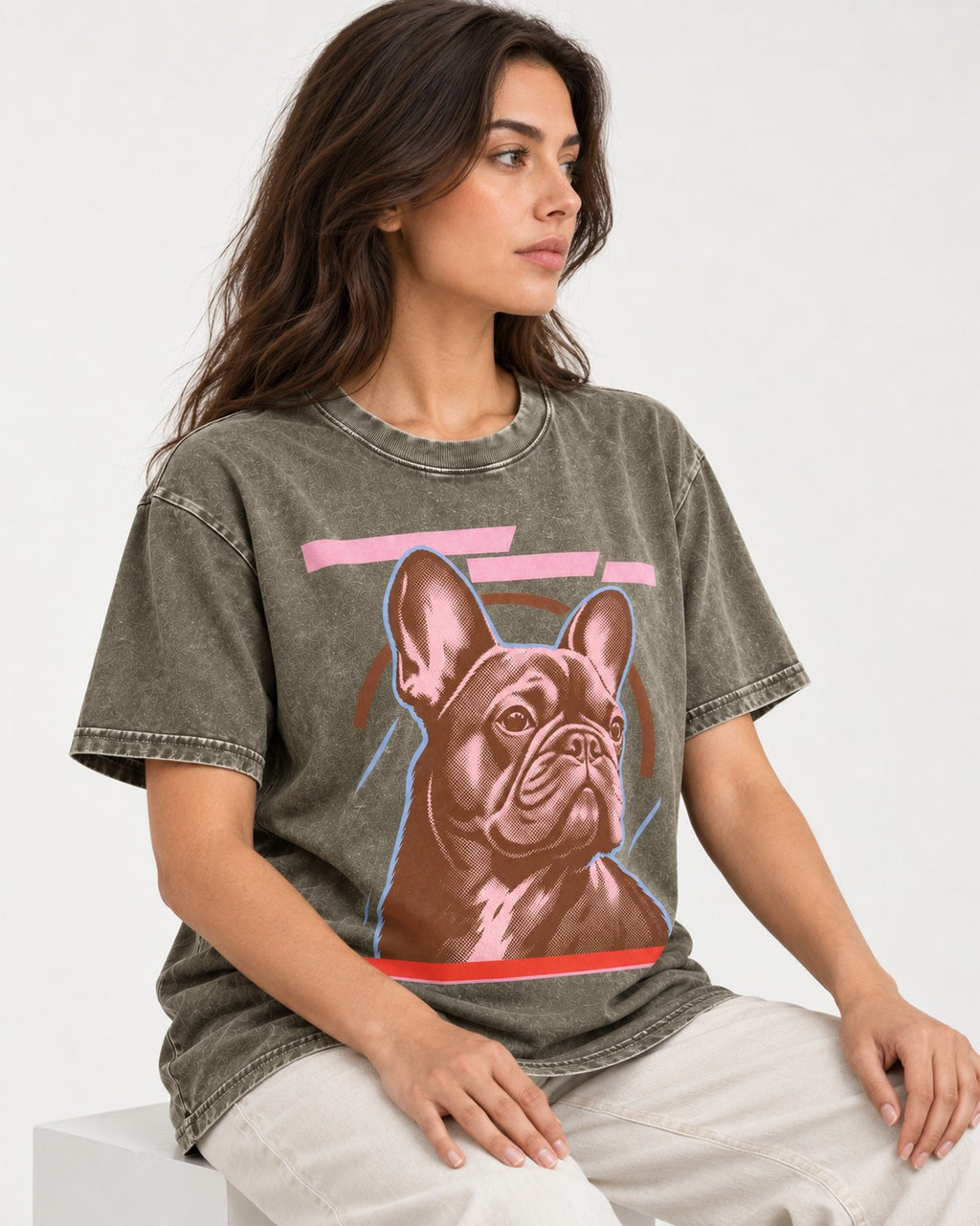 Frenchie Geometric Portrait Graphic Washed Tee in Army Green, worn by a seated model