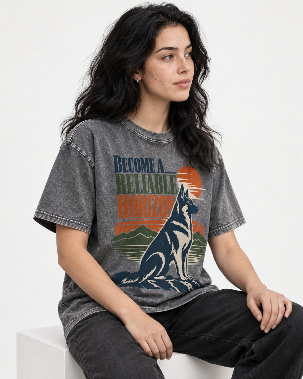 German Shepherd Dog Become a Reliable Horizon Washed Tee in Gray, worn by a seated model