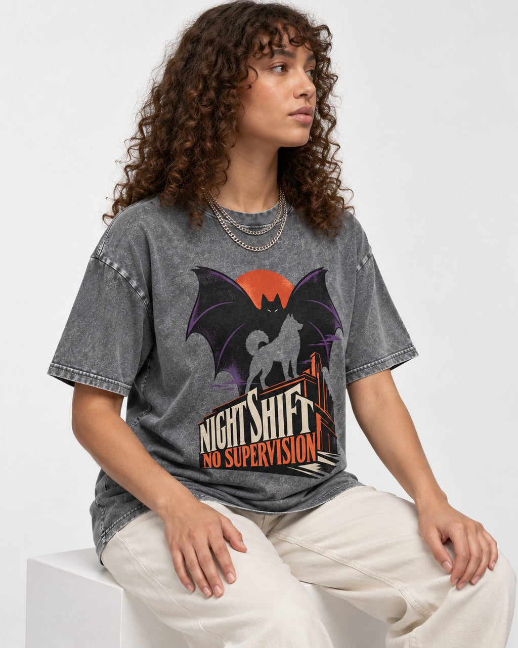 Husky Night Shift No Supervision Washed Tee in Gray, worn by a seated model