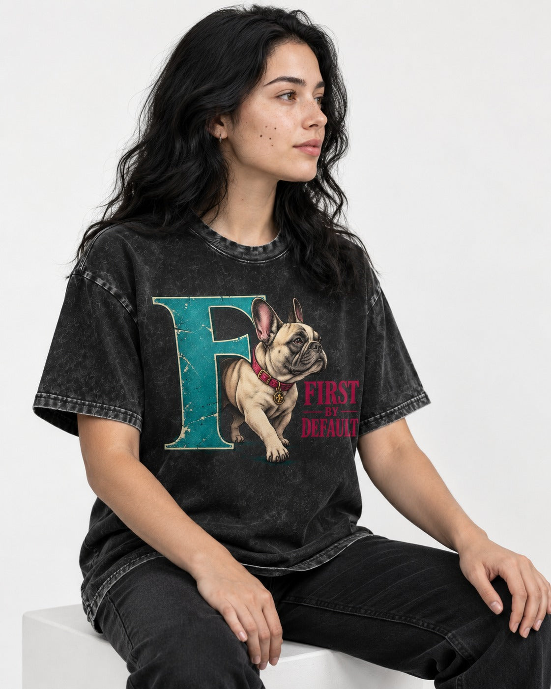Frenchie First by Default Teal F Graphic Washed Tee in Black, worn by a seated model