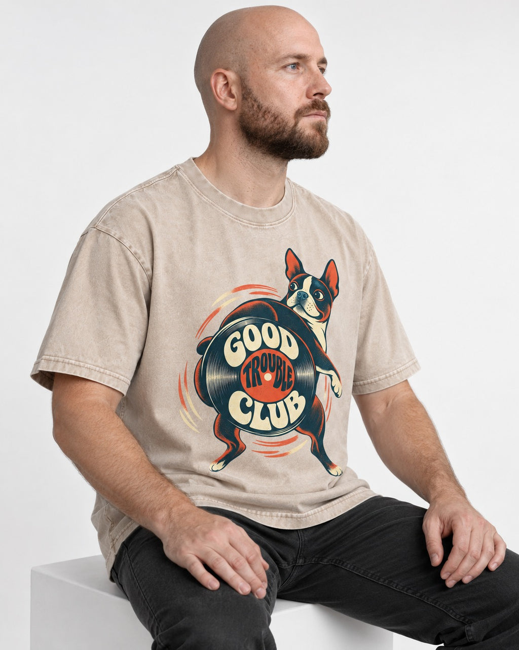 Good Trouble Club Boston Terrier Washed Tee in Apricot, worn by a seated model