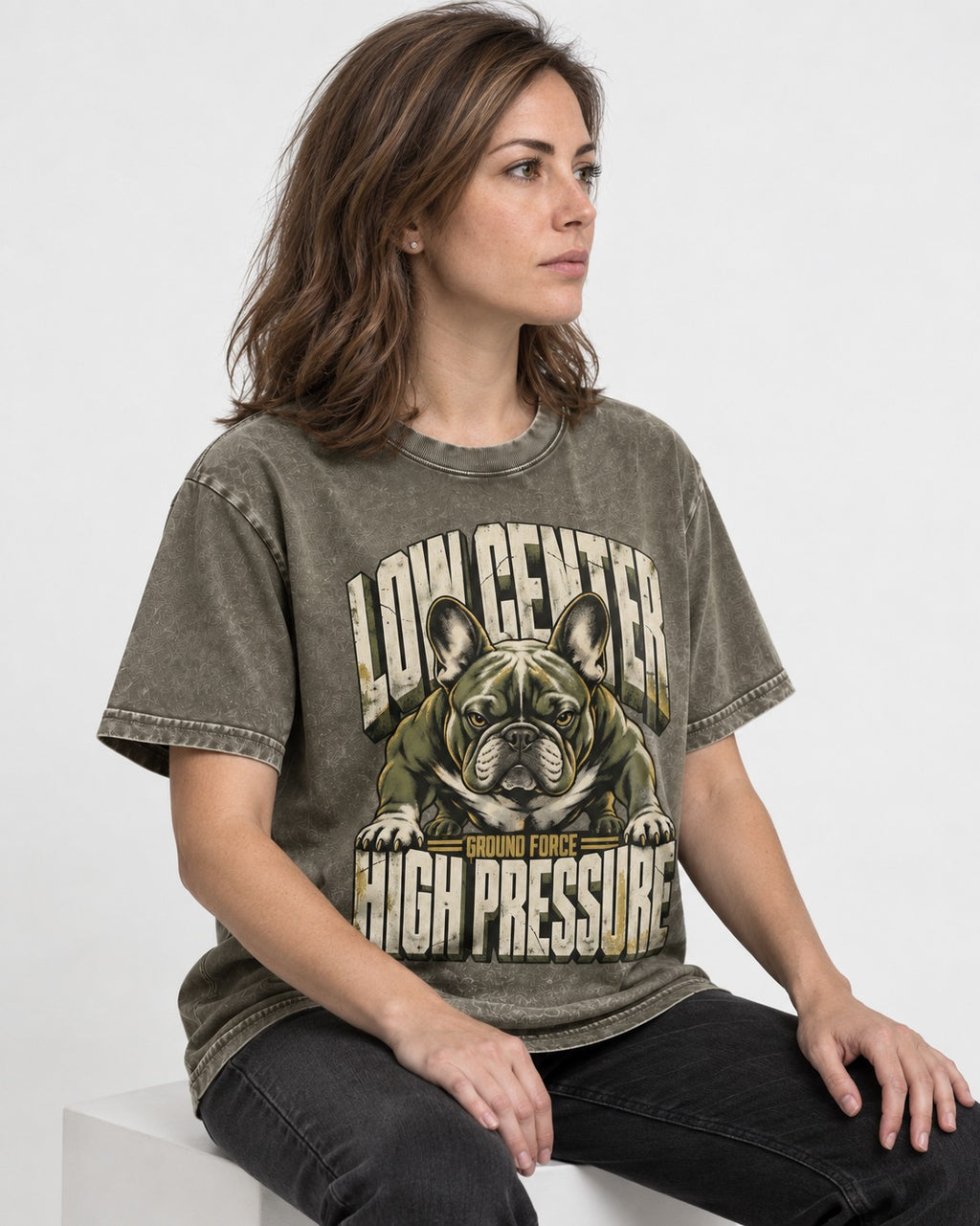 Frenchie Low Center High Pressure Graphic Washed Tee in Army Green, worn by a seated model